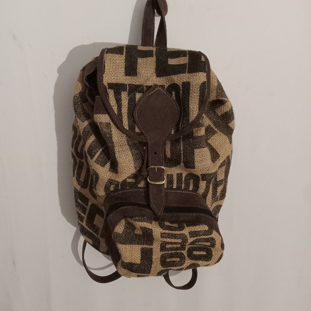 Backpack from feed sac. Made in Guatemala.  Preowned ,lightweight suede straps.